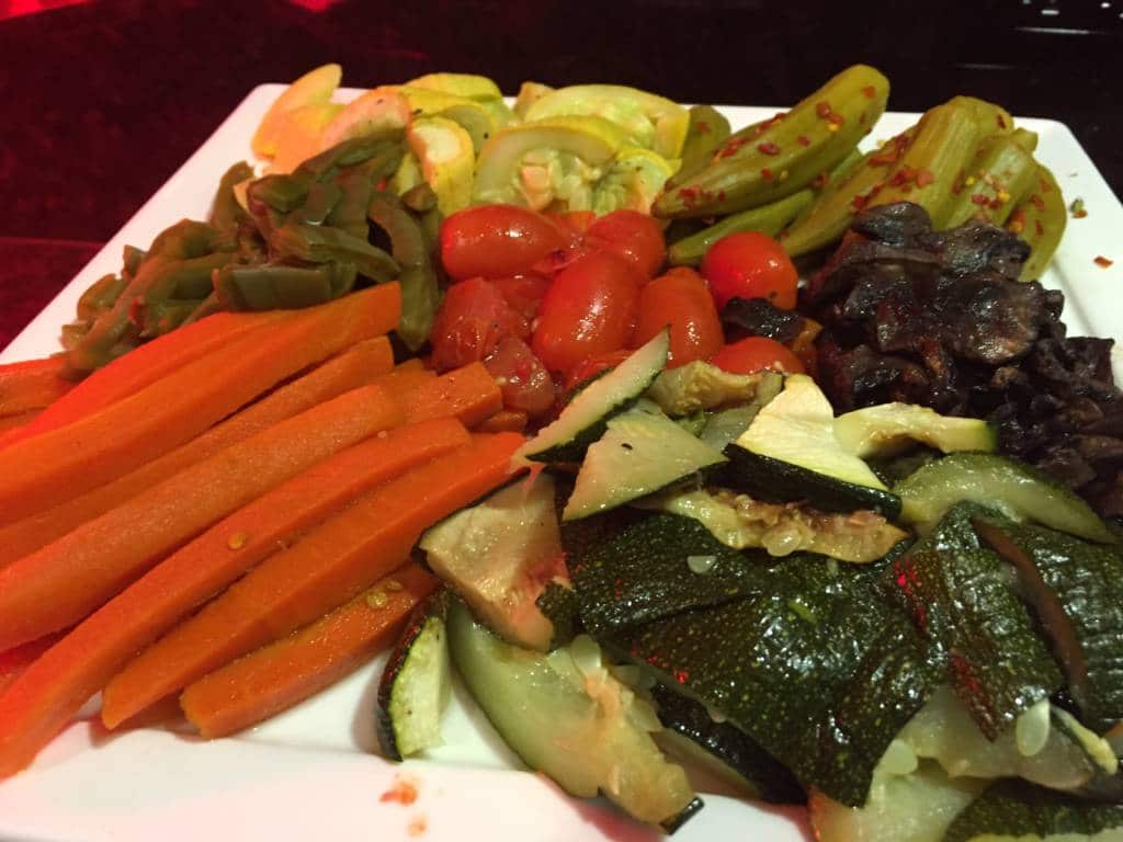 A plate of cooked vegetables