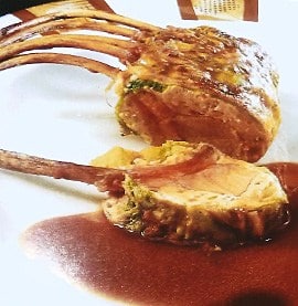 Cooked lamb rack with a sauce